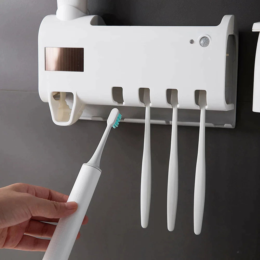 Toothbrush holder with Automatic Toothpaste Dispenser and UV light Sterilizer  Cleaner.